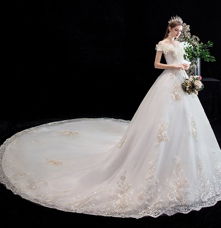 Flat shoulder beautiful dream bride big trailing wedding dress