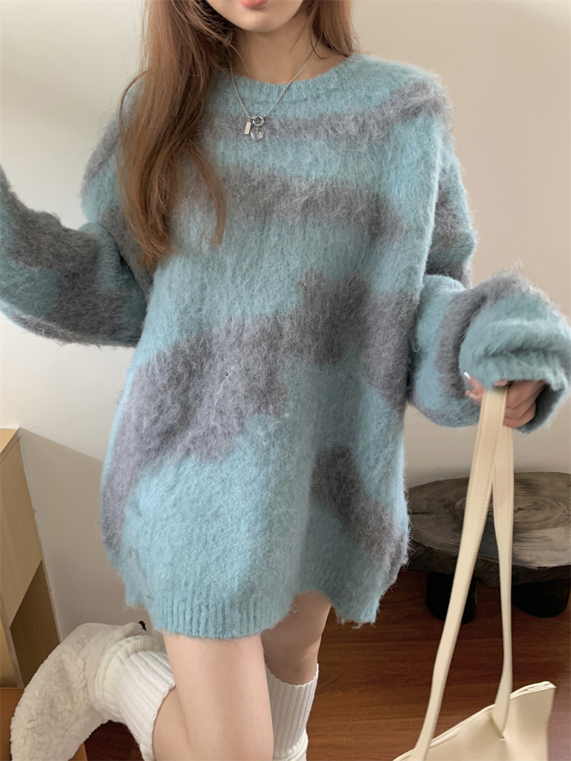 Blue pullover thick loose tender wears outside sweater