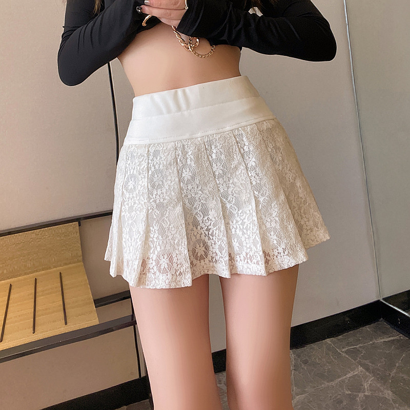 Pleated white lace skirt