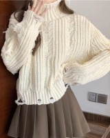 Knitted tassels high collar sweater