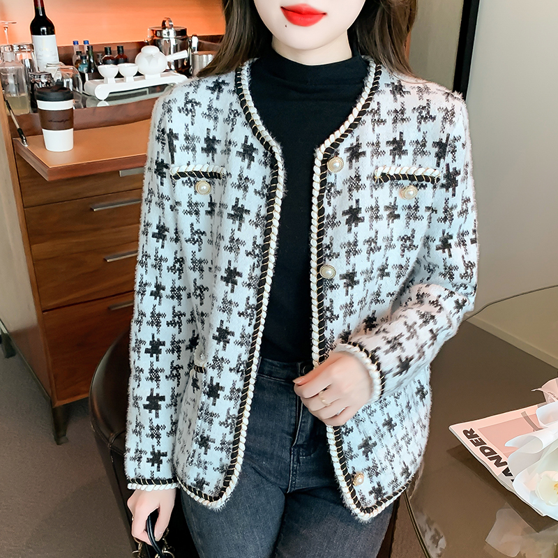 Wears outside houndstooth cardigan chanelstyle loose sweater