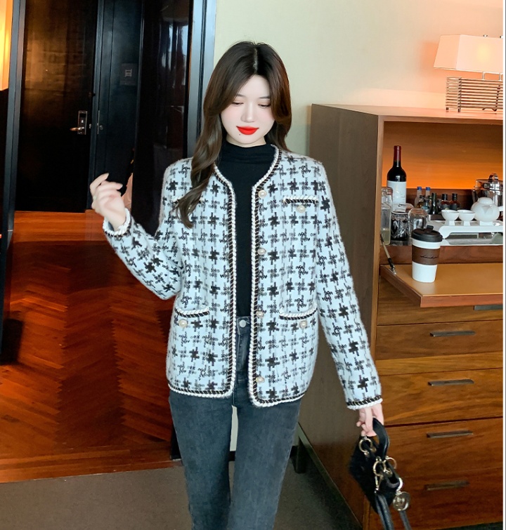 Wears outside houndstooth cardigan chanelstyle loose sweater