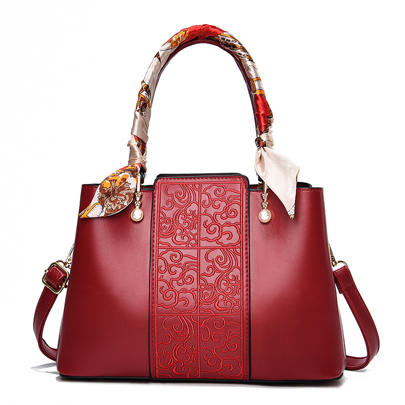 Middle-aged red handbag wedding bride bag for women