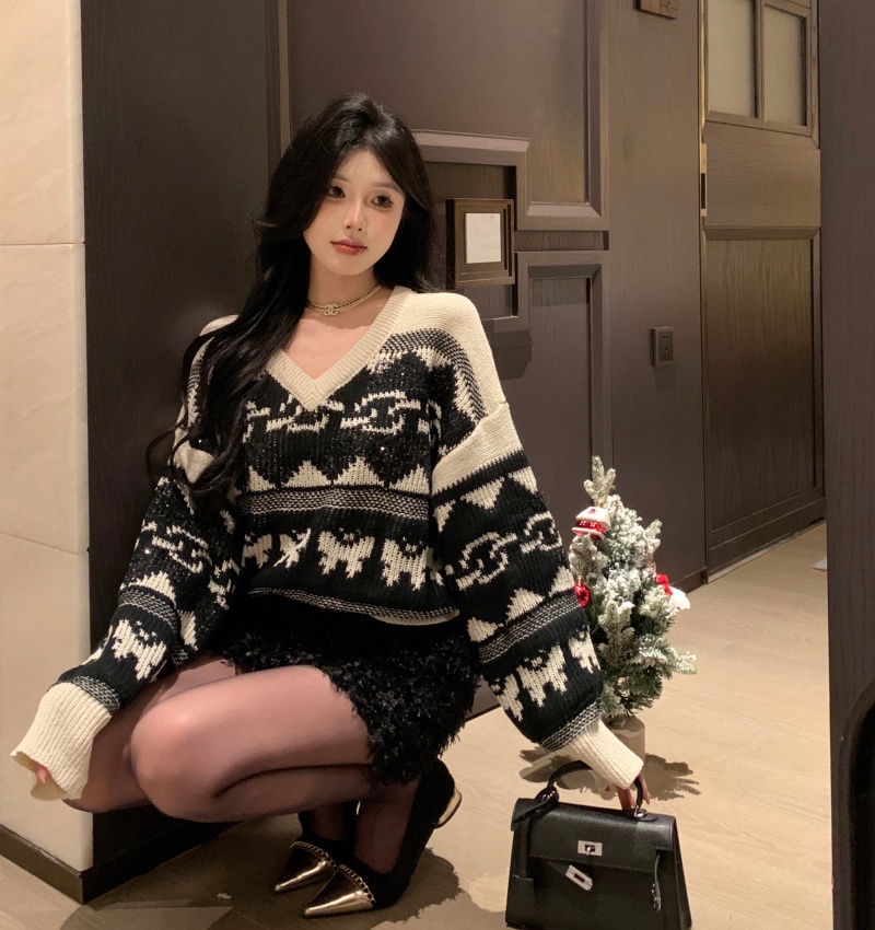 Temperament skirt black-white sweater a set