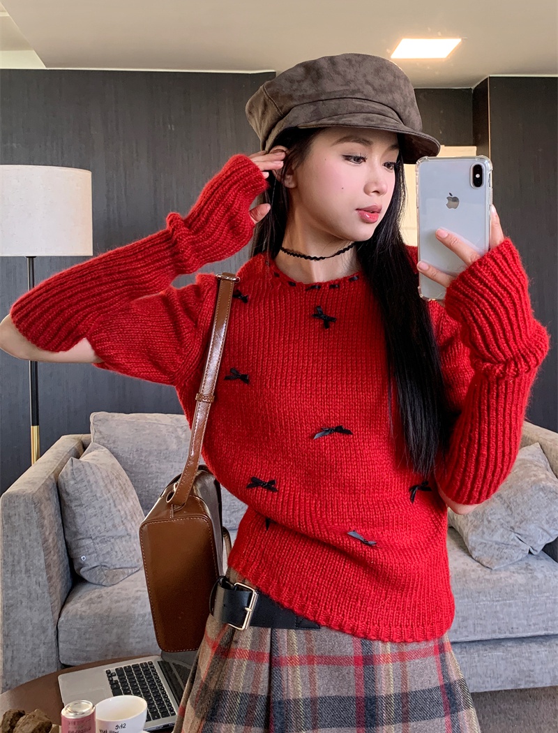Knitted sleeve bow sweater