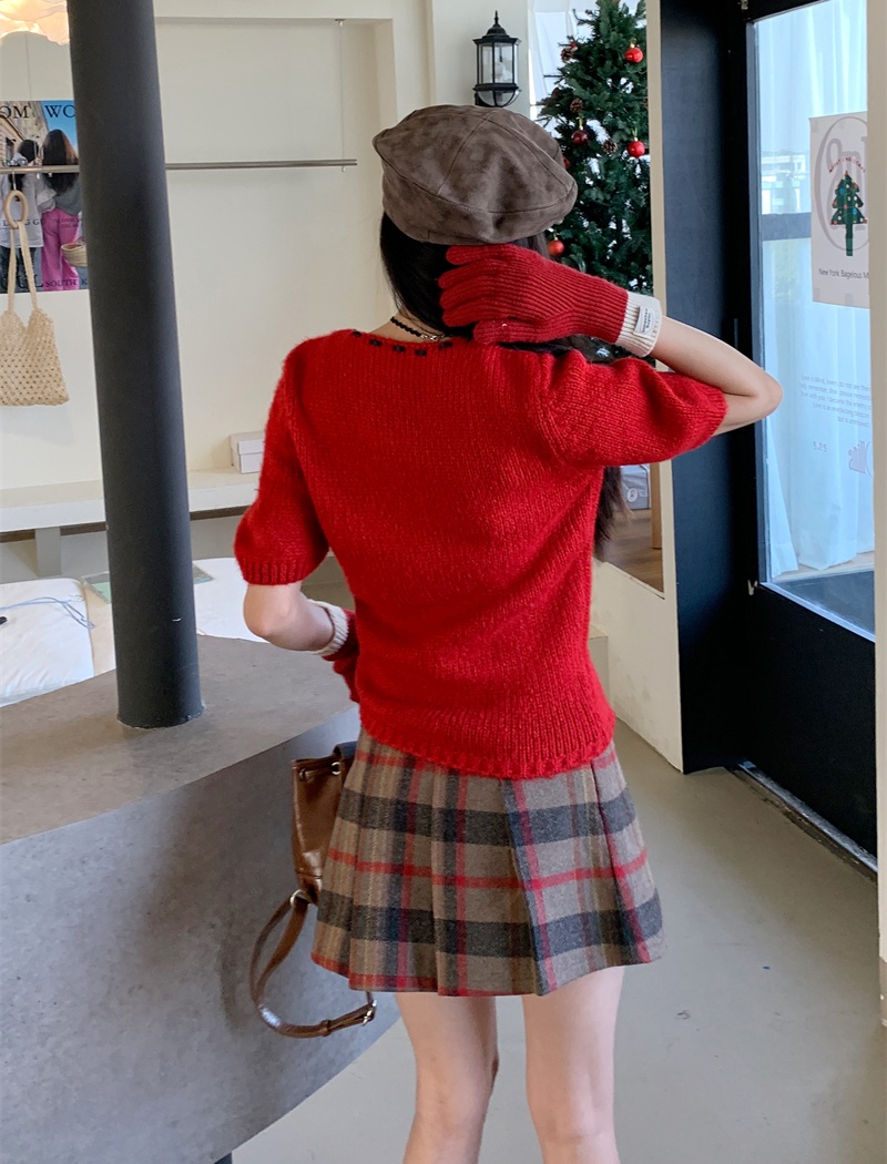Knitted sleeve bow sweater