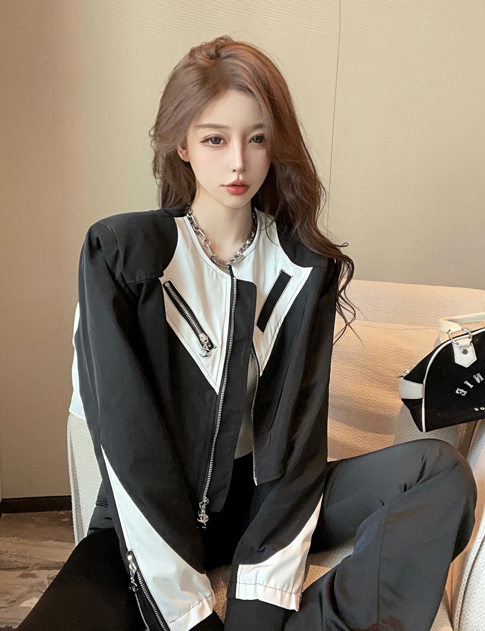 Niche black-white oblique zipper jacket