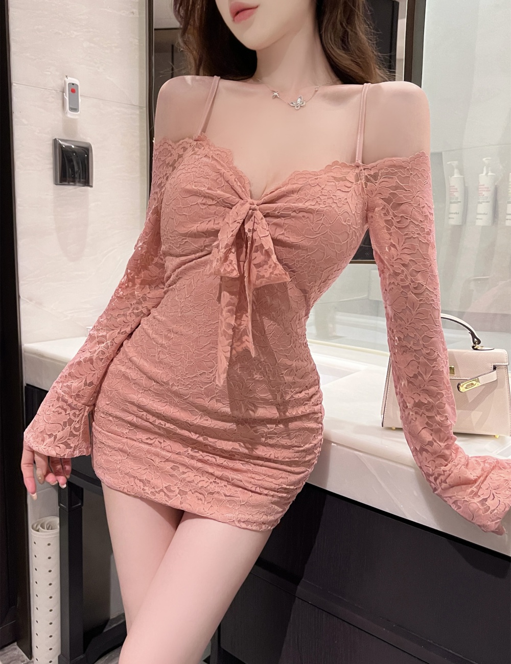 Tight hollow long sleeve sexy drawstring dress