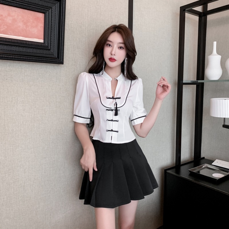 Show young pleated tops spring and summer skirt a set