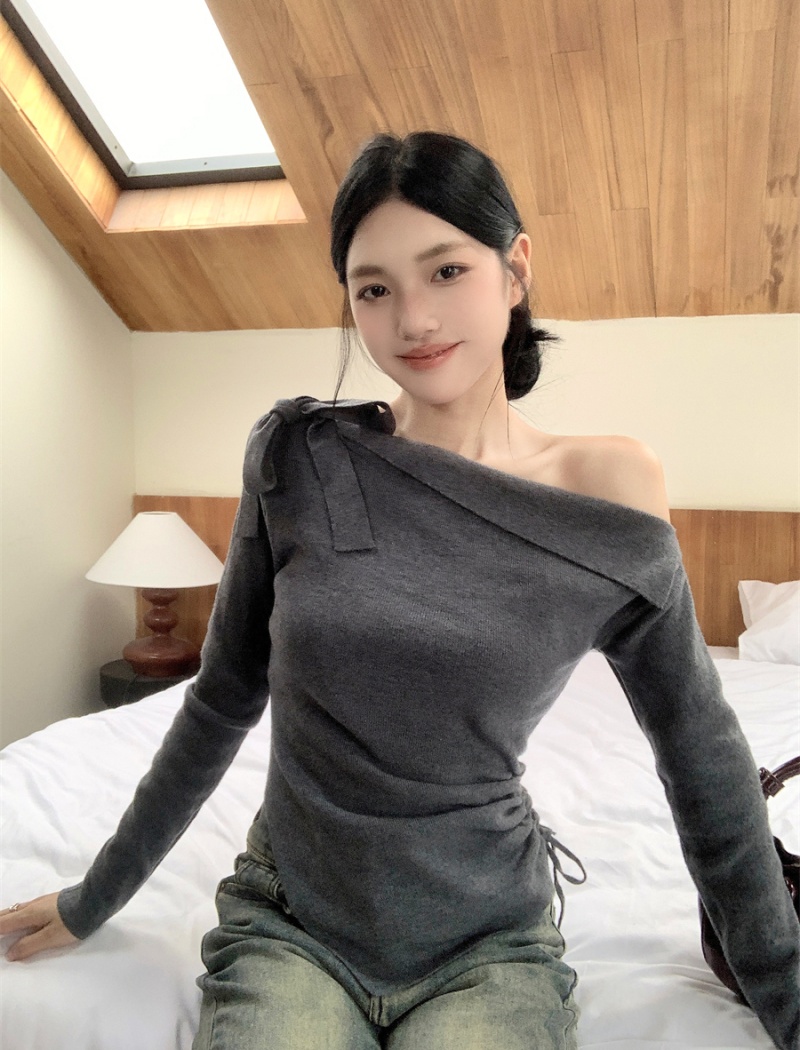 Frenum sloping shoulder tops irregular sweater