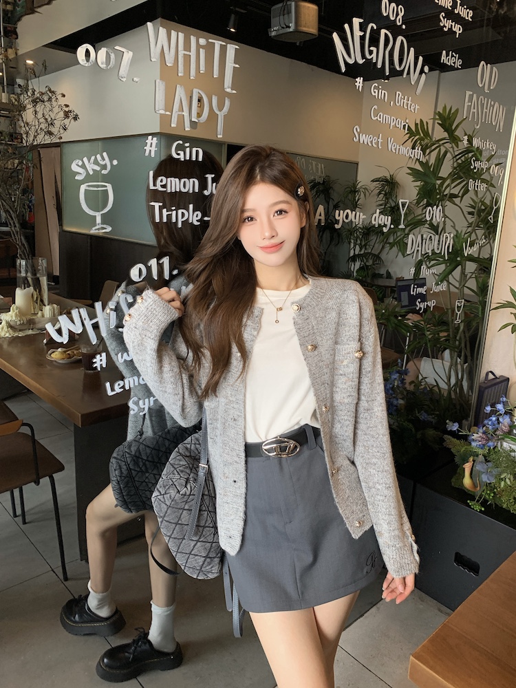 Knitted round neck cardigan gray wears outside sweater