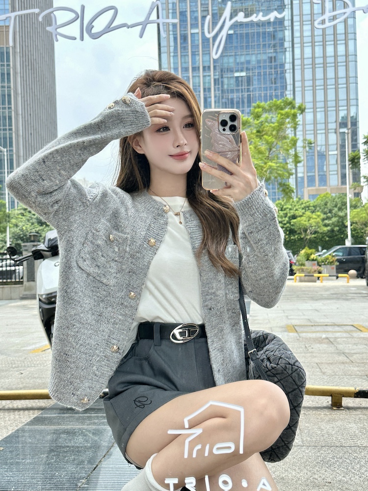 Knitted round neck cardigan gray wears outside sweater