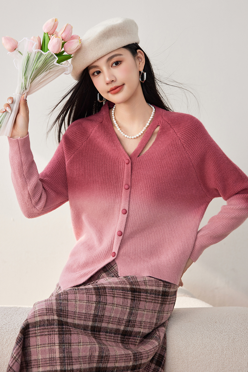 Gradient wears outside cardigan pink sweater