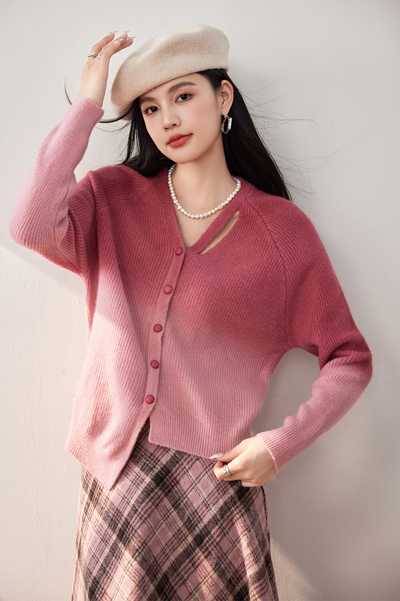 Gradient wears outside cardigan pink sweater