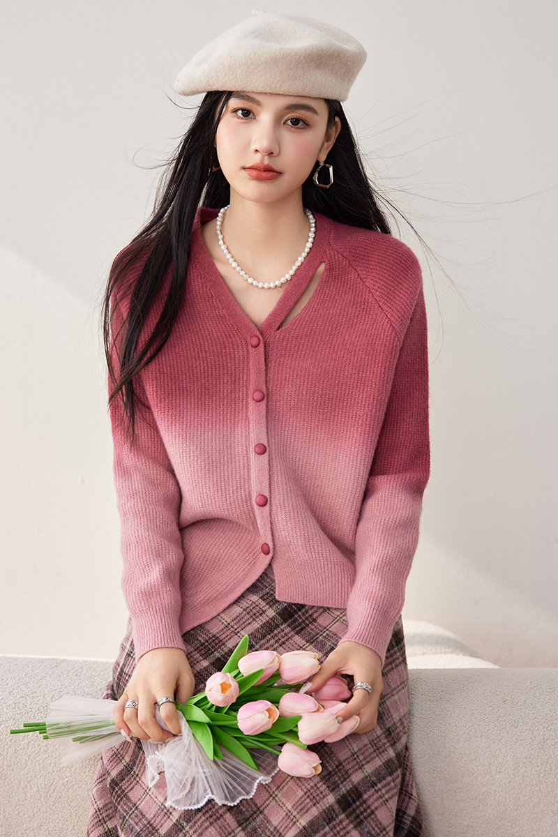 Gradient wears outside cardigan pink sweater