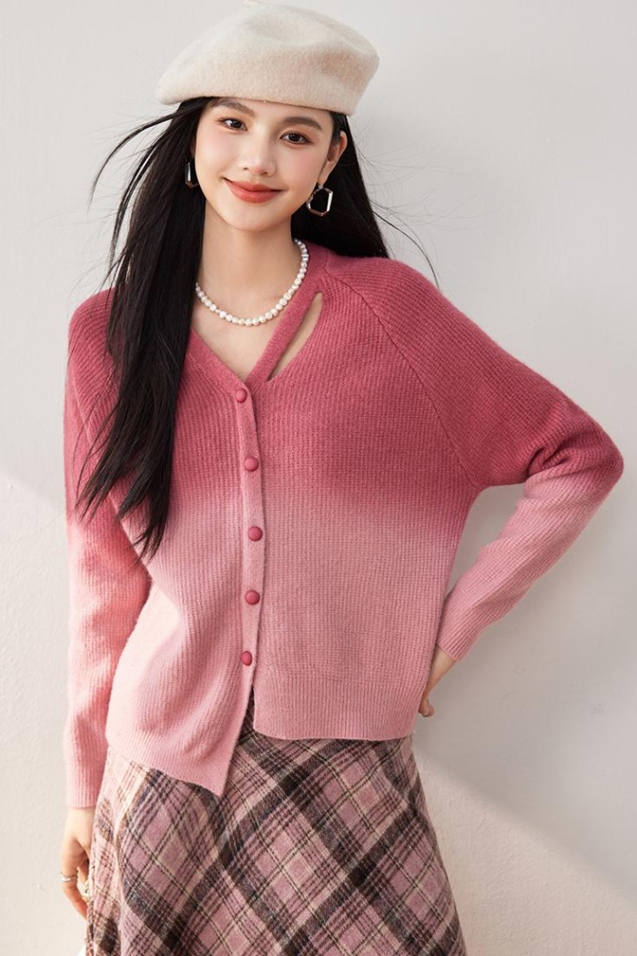 Gradient wears outside cardigan pink sweater