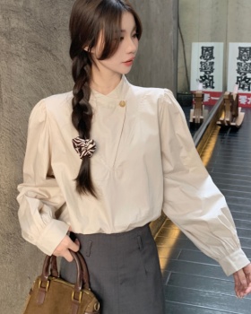 Irregular long sleeve spring buckle slim shirt