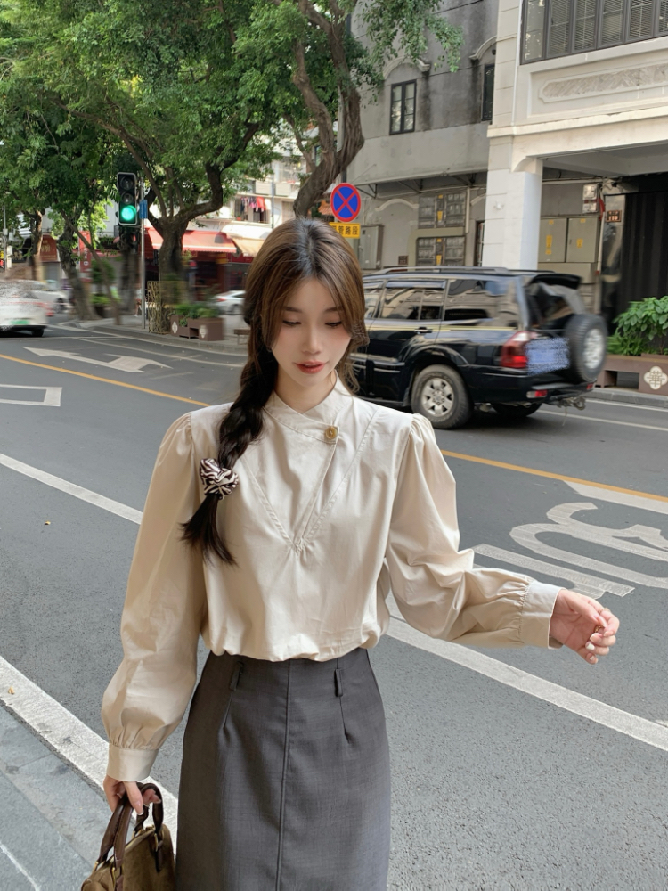 Irregular long sleeve spring buckle slim shirt