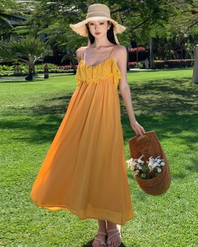 Vacation yellow sandy beach was white sling dress