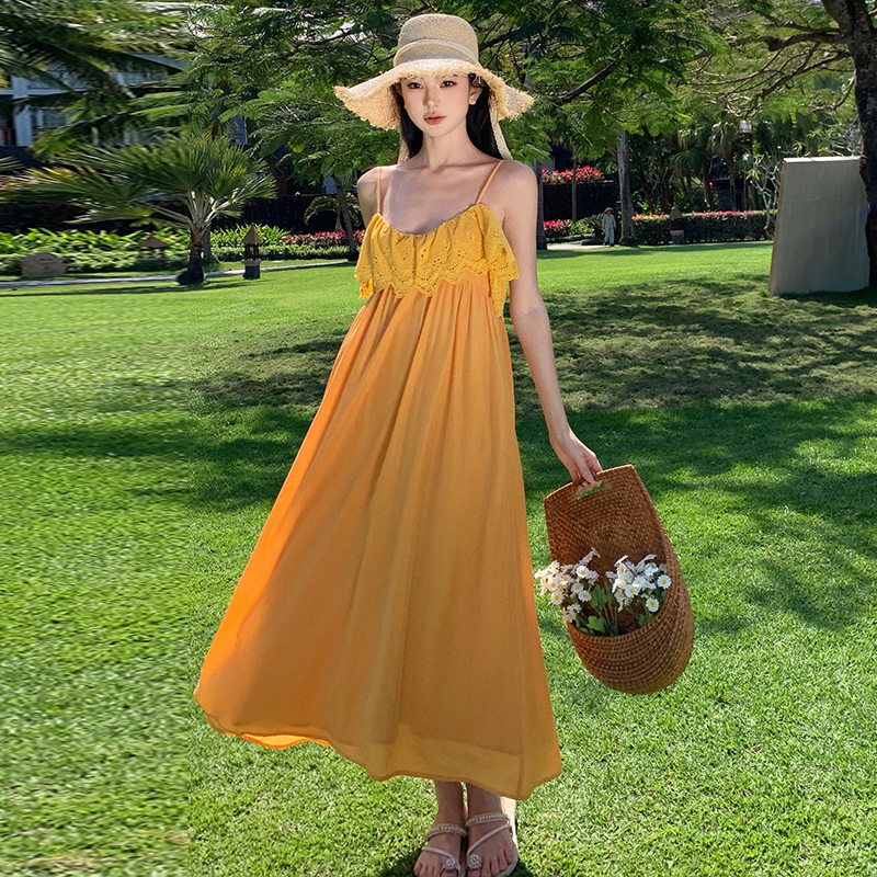 Vacation yellow sandy beach was white sling dress