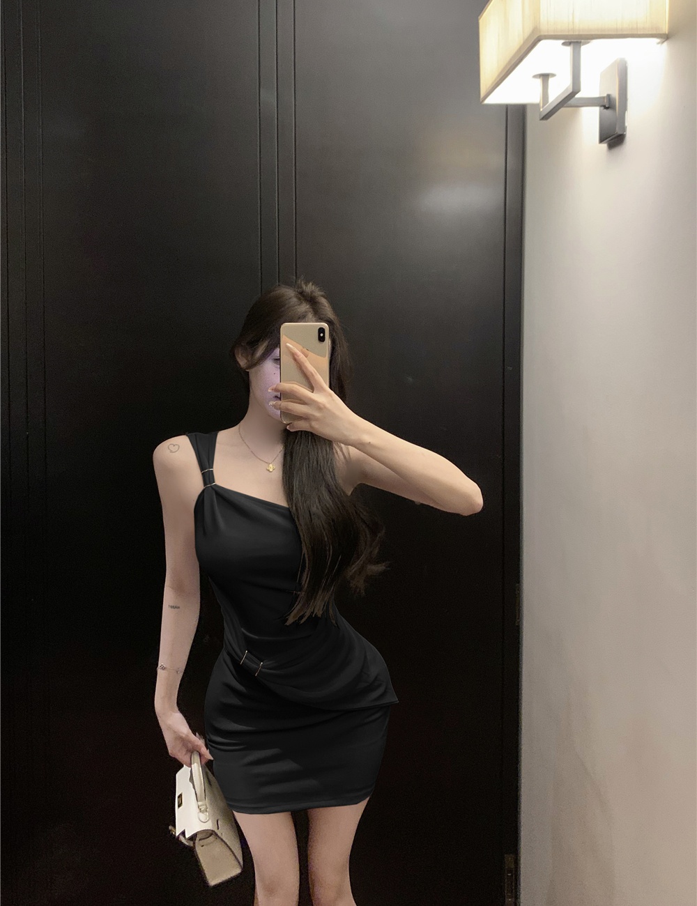 Strapless bow sloping shoulder package hip dress