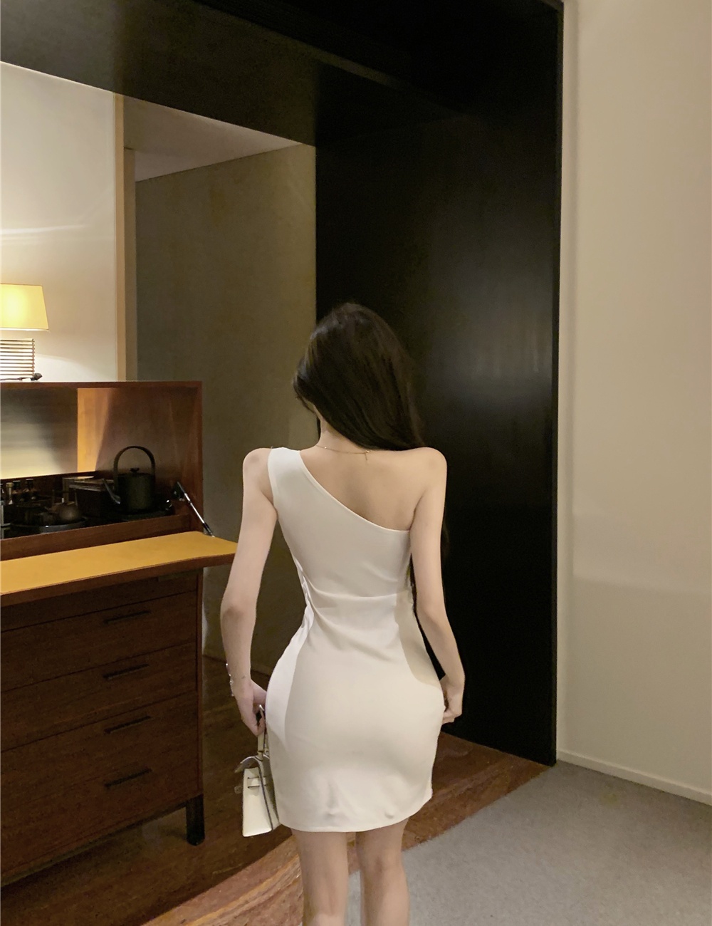 Strapless bow sloping shoulder package hip dress