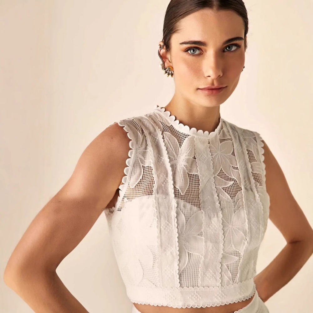 Sleeveless round neck short skirt hollow tops a set