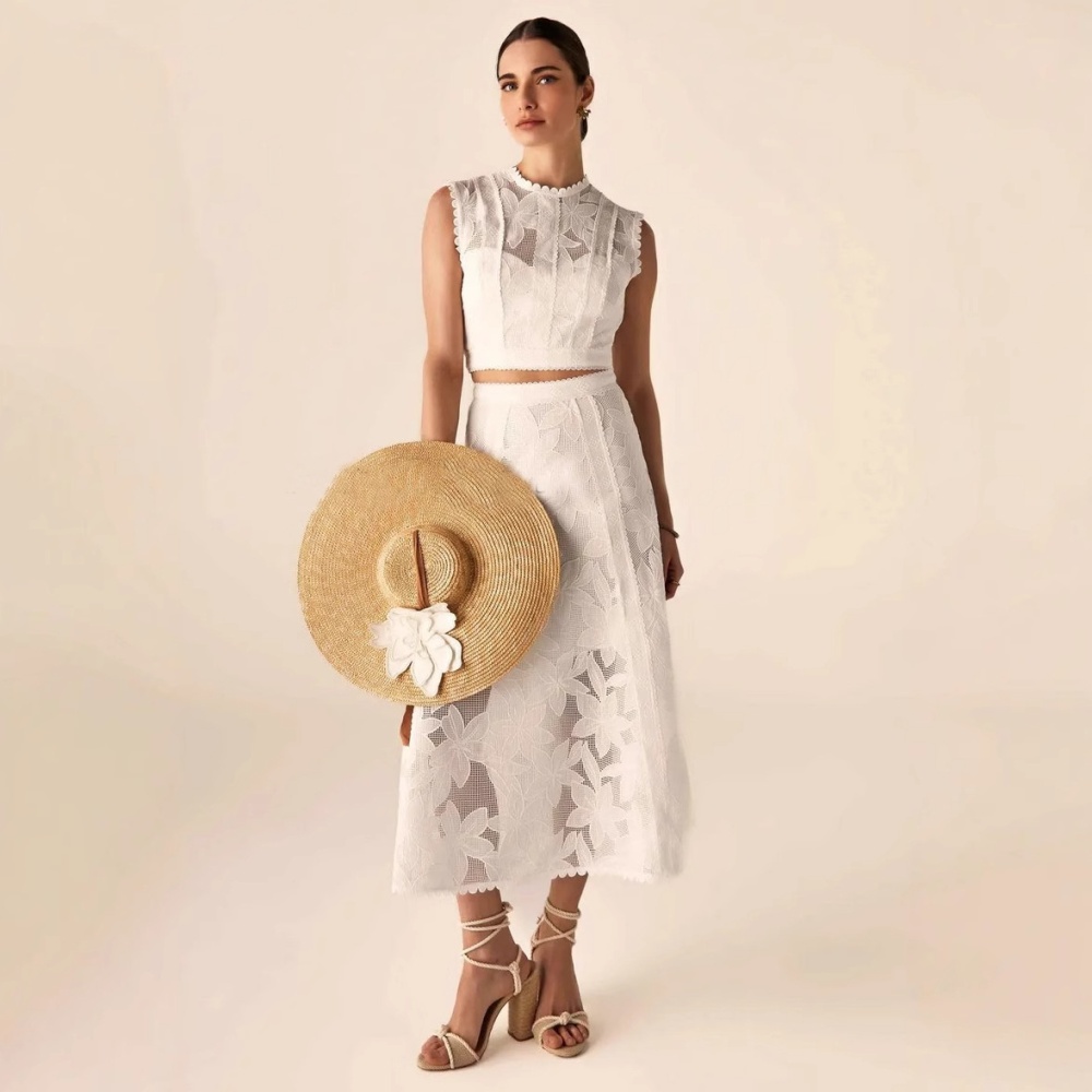 Sleeveless round neck short skirt hollow tops a set