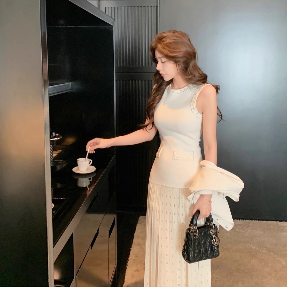 Elegant knitted spring and summer sleeveless dress