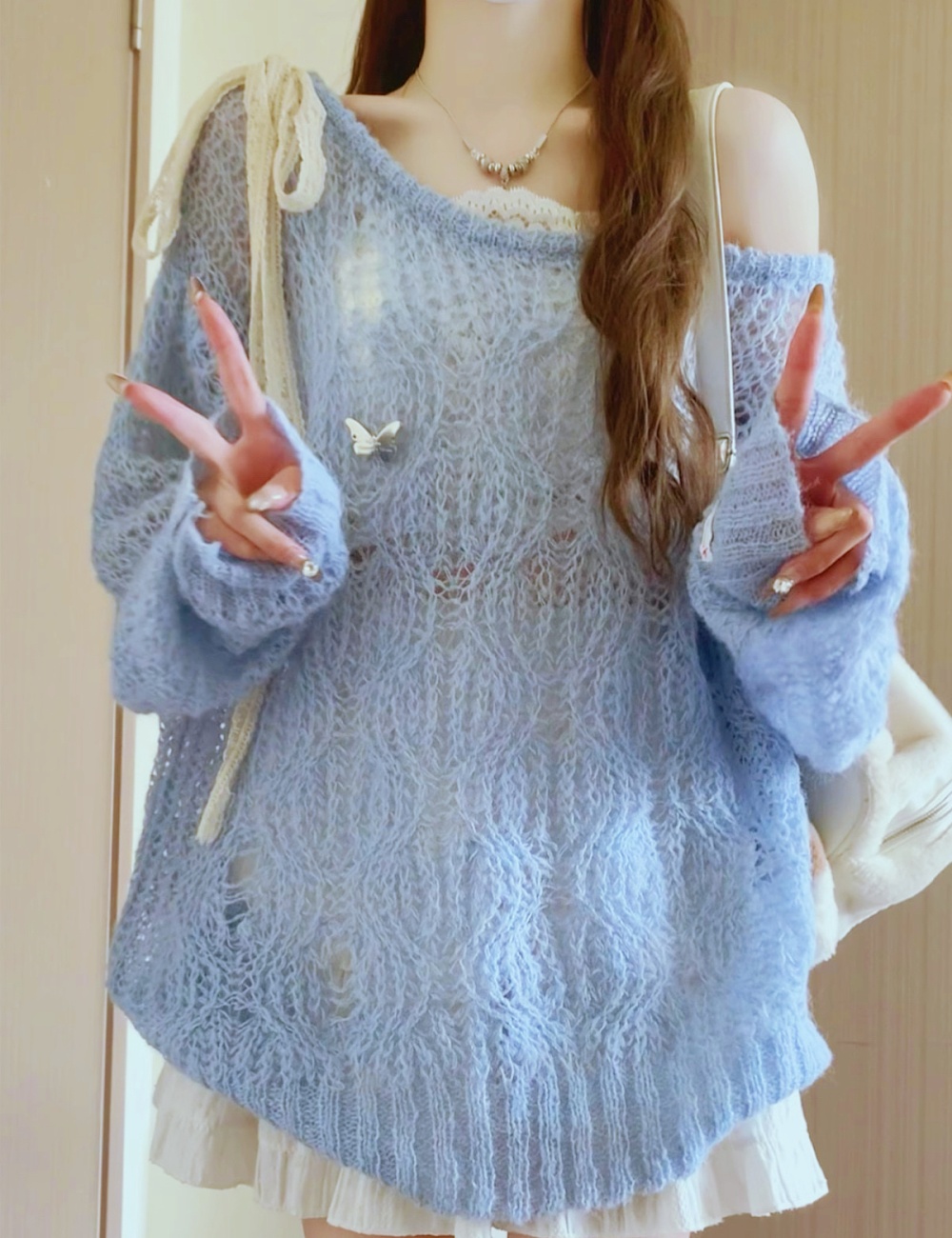 Sunscreen bow lazy thin tops hollow outside the ride loose sweater