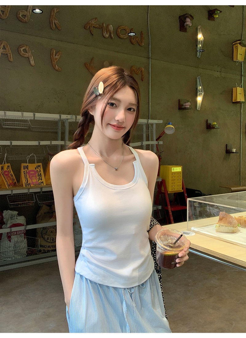 Wears outside tops with chest pad vest for women
