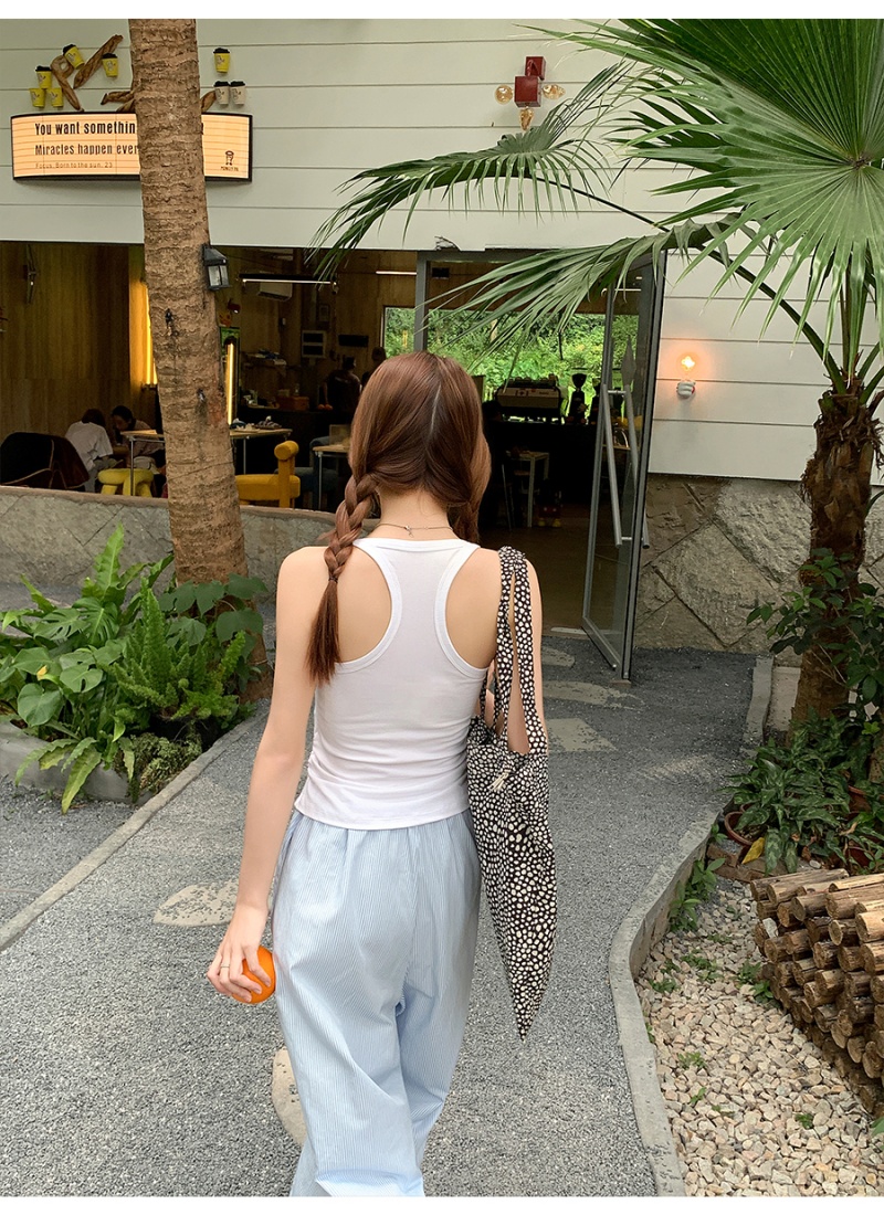 Wears outside tops with chest pad vest for women