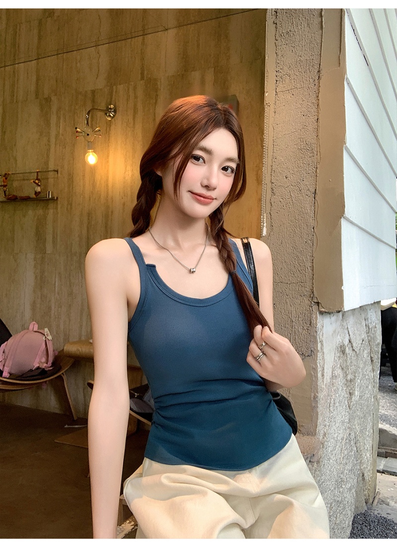 Wears outside tops with chest pad vest for women
