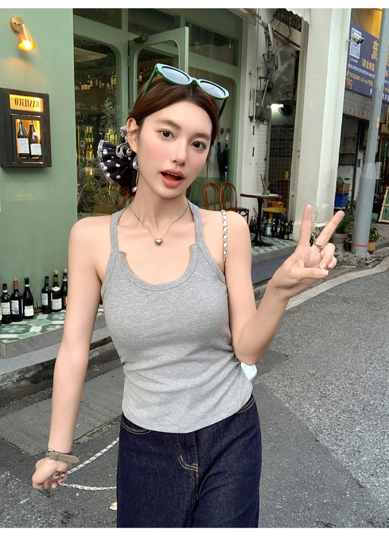 Wears outside tops with chest pad vest for women