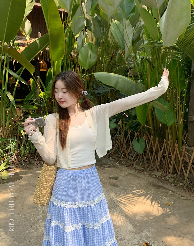 Light knitted cardigan with sling tops for women