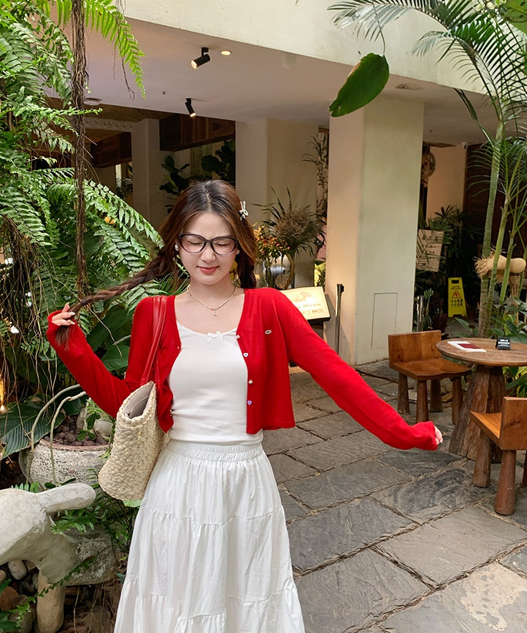 Light knitted cardigan with sling tops for women