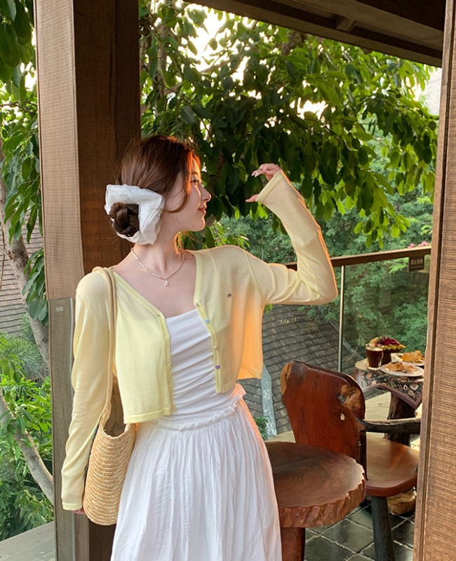 Light knitted cardigan with sling tops for women