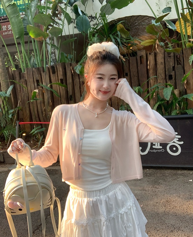 Light knitted cardigan with sling tops for women