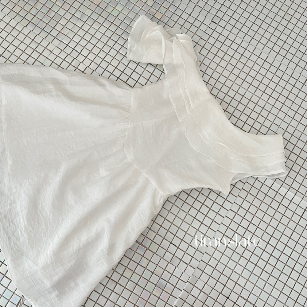 Temperament white sloping shoulder lotus leaf edges dress