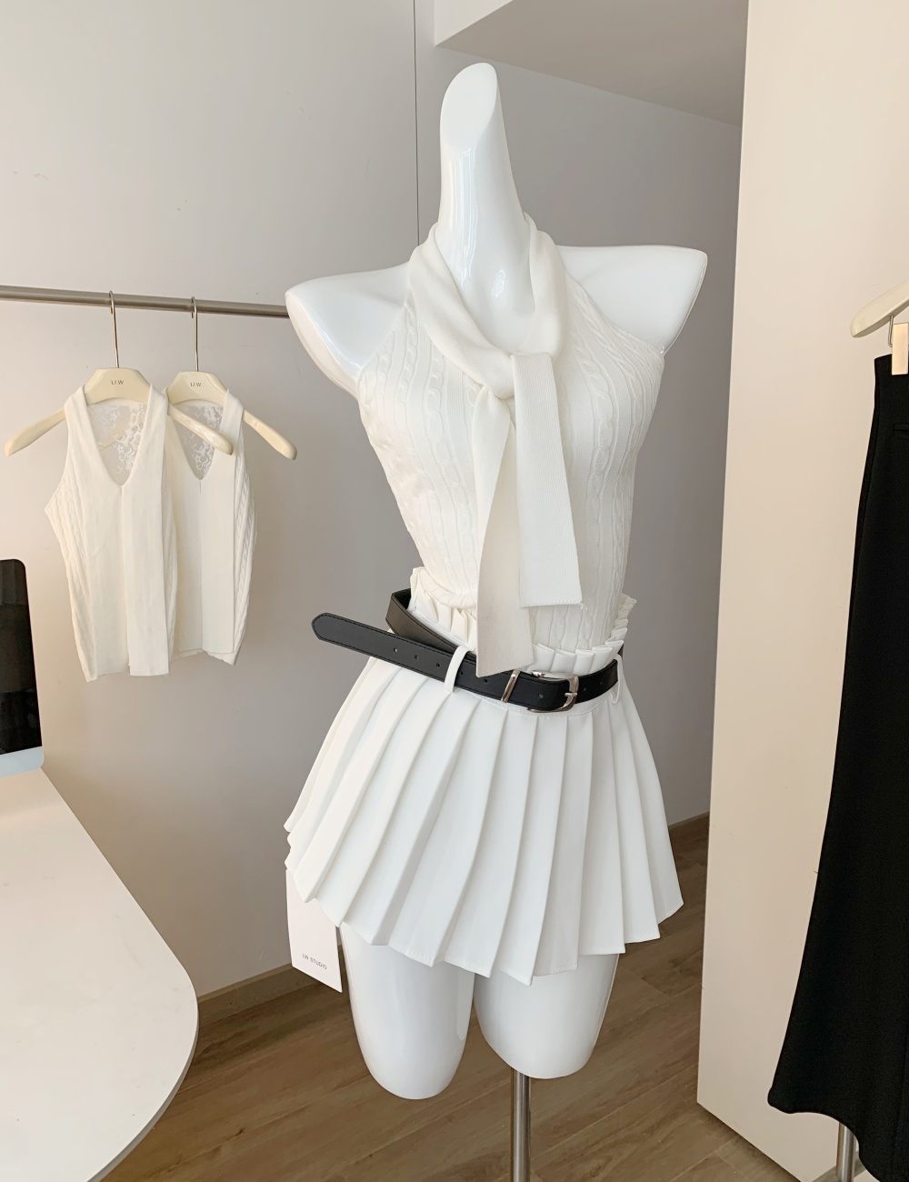 Pleated white skirt wears outside tops a set for women