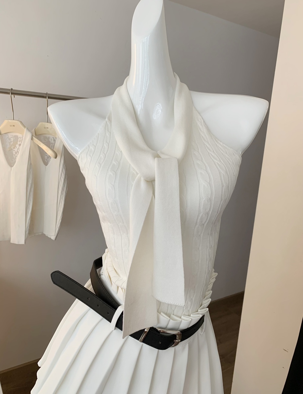 Pleated white skirt wears outside tops a set for women