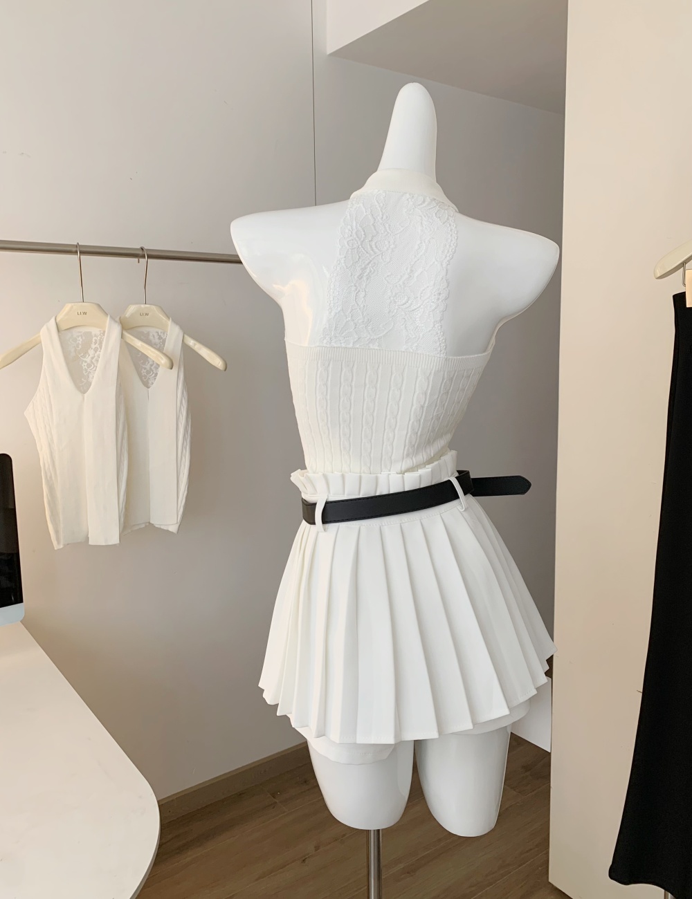 Pleated white skirt wears outside tops a set for women