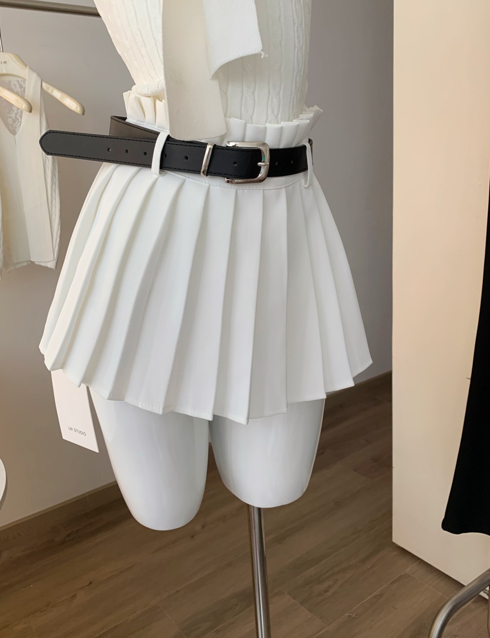 Pleated white skirt wears outside tops a set for women