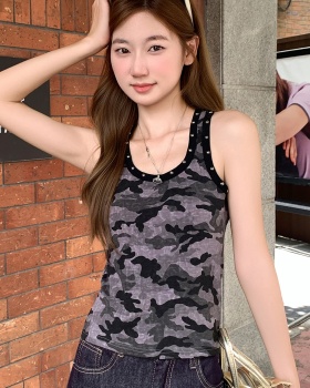 Rivet wears outside work clothing sling vest