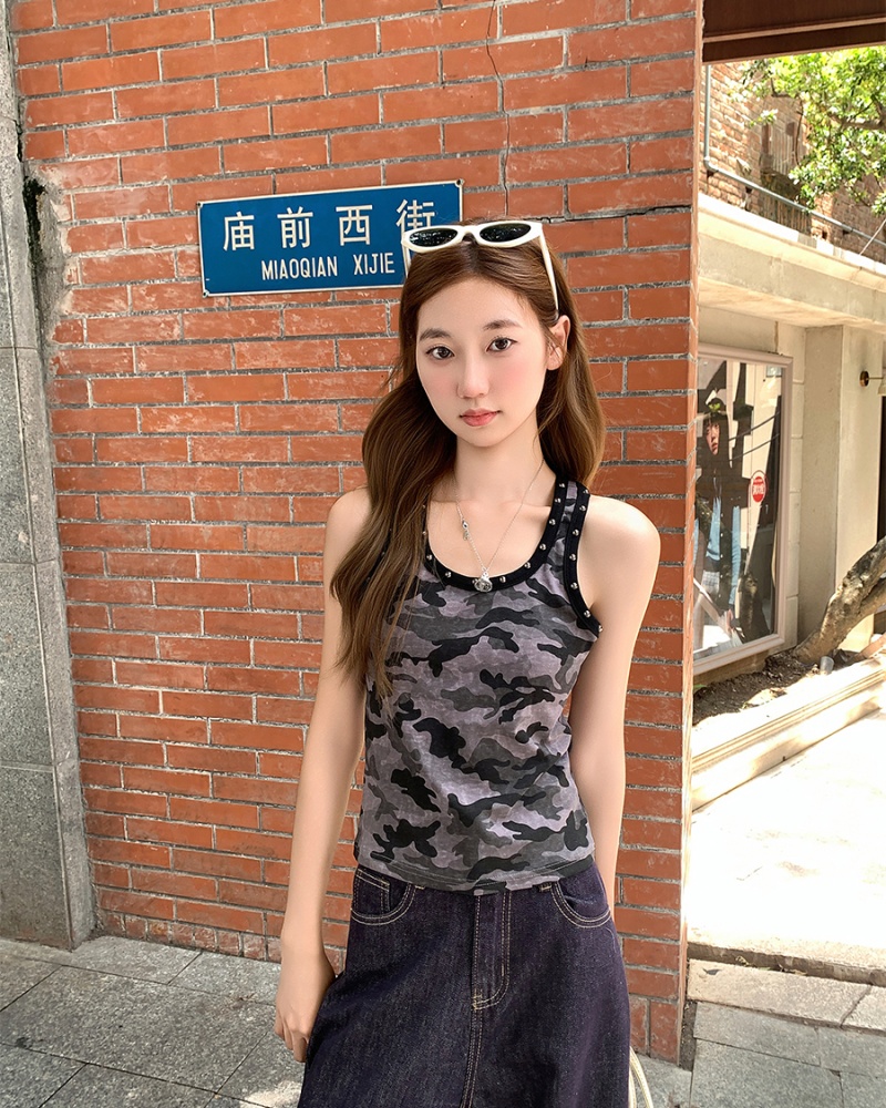 Rivet wears outside work clothing sling vest