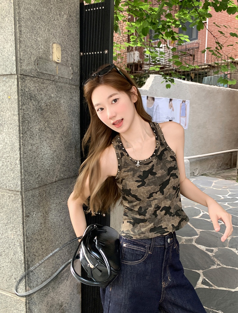 Rivet wears outside work clothing sling vest