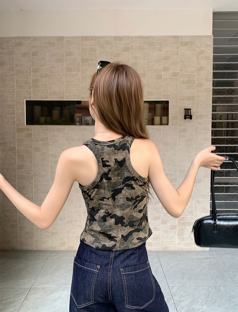 Rivet wears outside work clothing sling vest