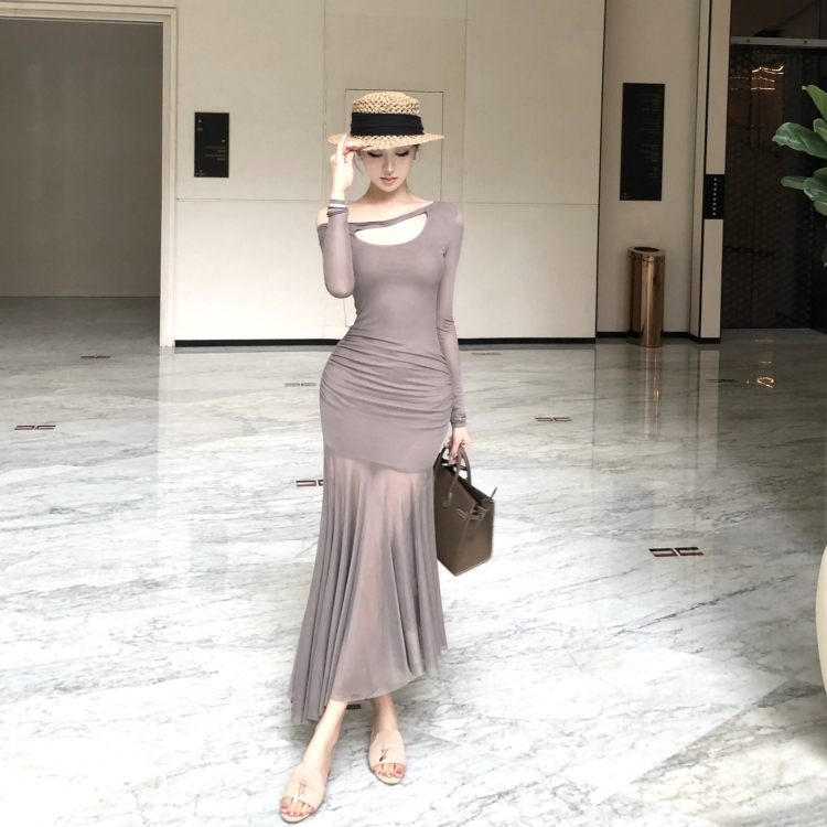 Hollow long sleeve slim long sloping shoulder dress