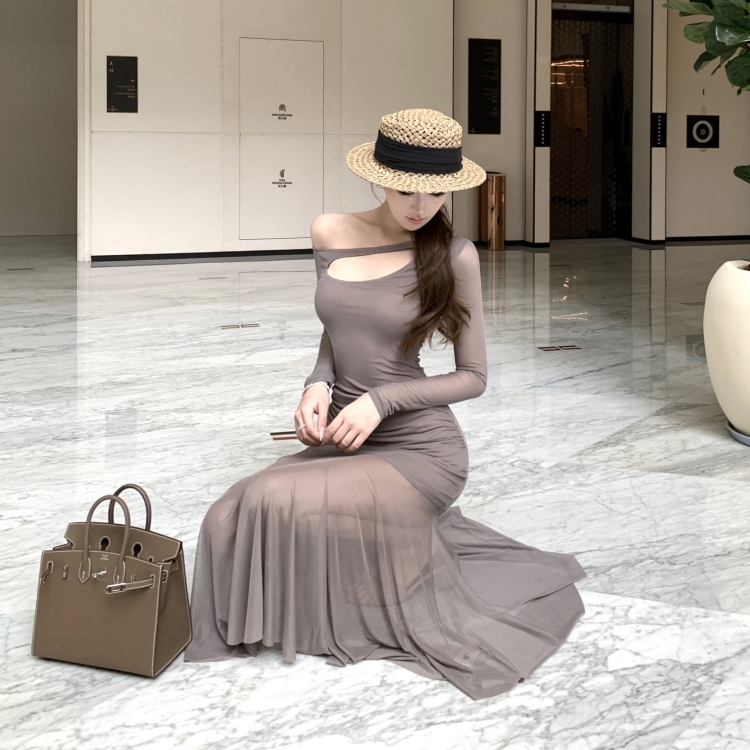 Hollow long sleeve slim long sloping shoulder dress