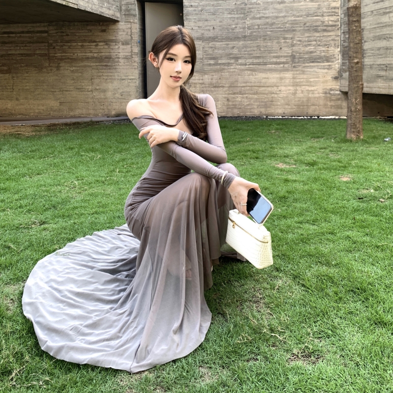 Hollow long sleeve slim long sloping shoulder dress